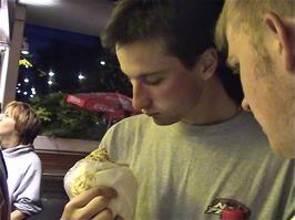 Tao and Gavin try their kababs at the Kebab Ouchy takeaway, Ouchy, 2 miles from the hostel